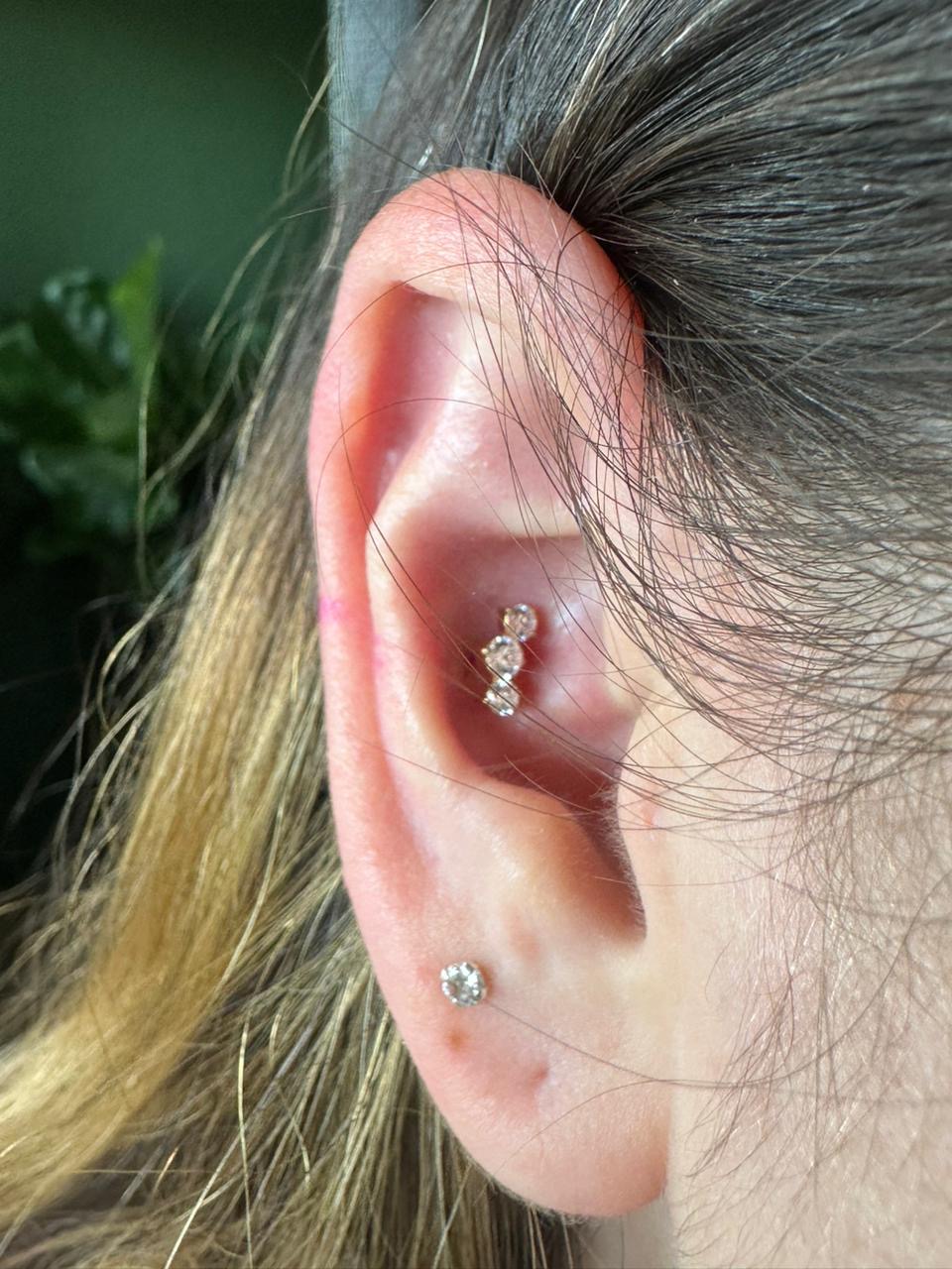 Healed helix and lobe ear piercings with gem jewellery by Ray